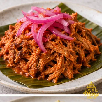 Yucatecan cochinita pibil with pickled red onion
