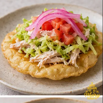 Yucatecan salbute with turkey, lettuce and tomato